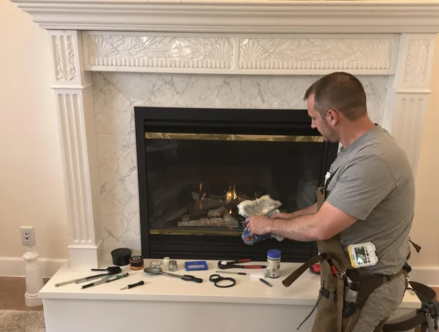 Dublin Chimney Sweep performing fireplace maintenance in Dublin, OH